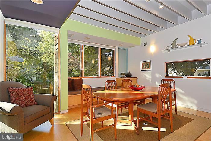 9206 Saybrook Avenue Silver Spring, MD 20901 - Photo 6 of 30 a view of a dining room with furniture window and outside view