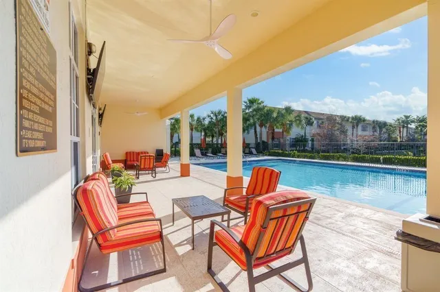 a view of swimming pool from a balcony