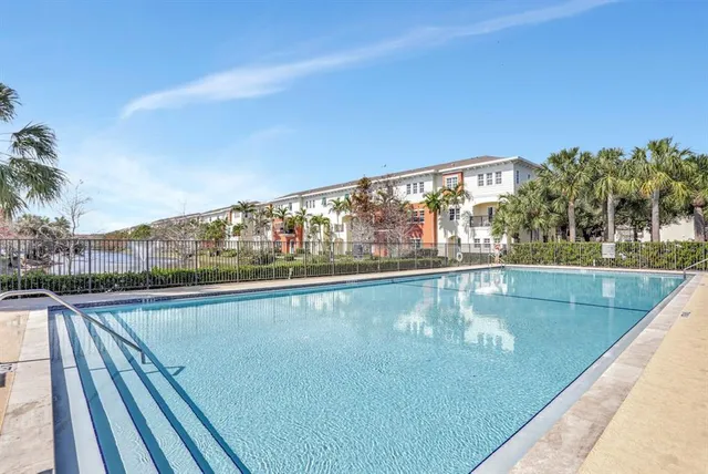a view of a house with a swimming pool