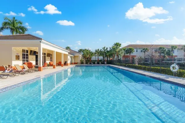 a view of swimming pool with a patio