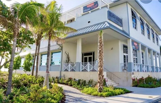 a view of a house with a swimming pool