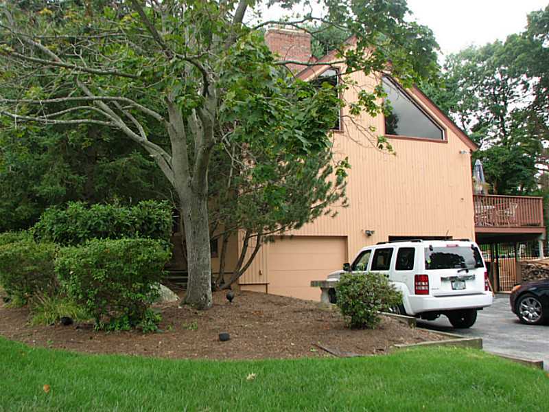 86 Thomas Lane Cranston, RI 02921 - Photo 4 of 17 Exterior Front. Side of house, garage