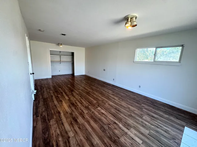 a view of a room with a window