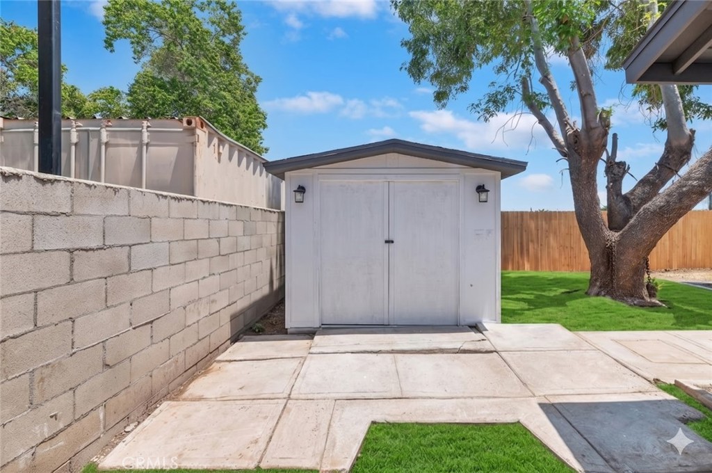 6940 Keating Drive Riverside, CA 92503 - Photo 15 of 15 a view of backyard of house with wooden fence