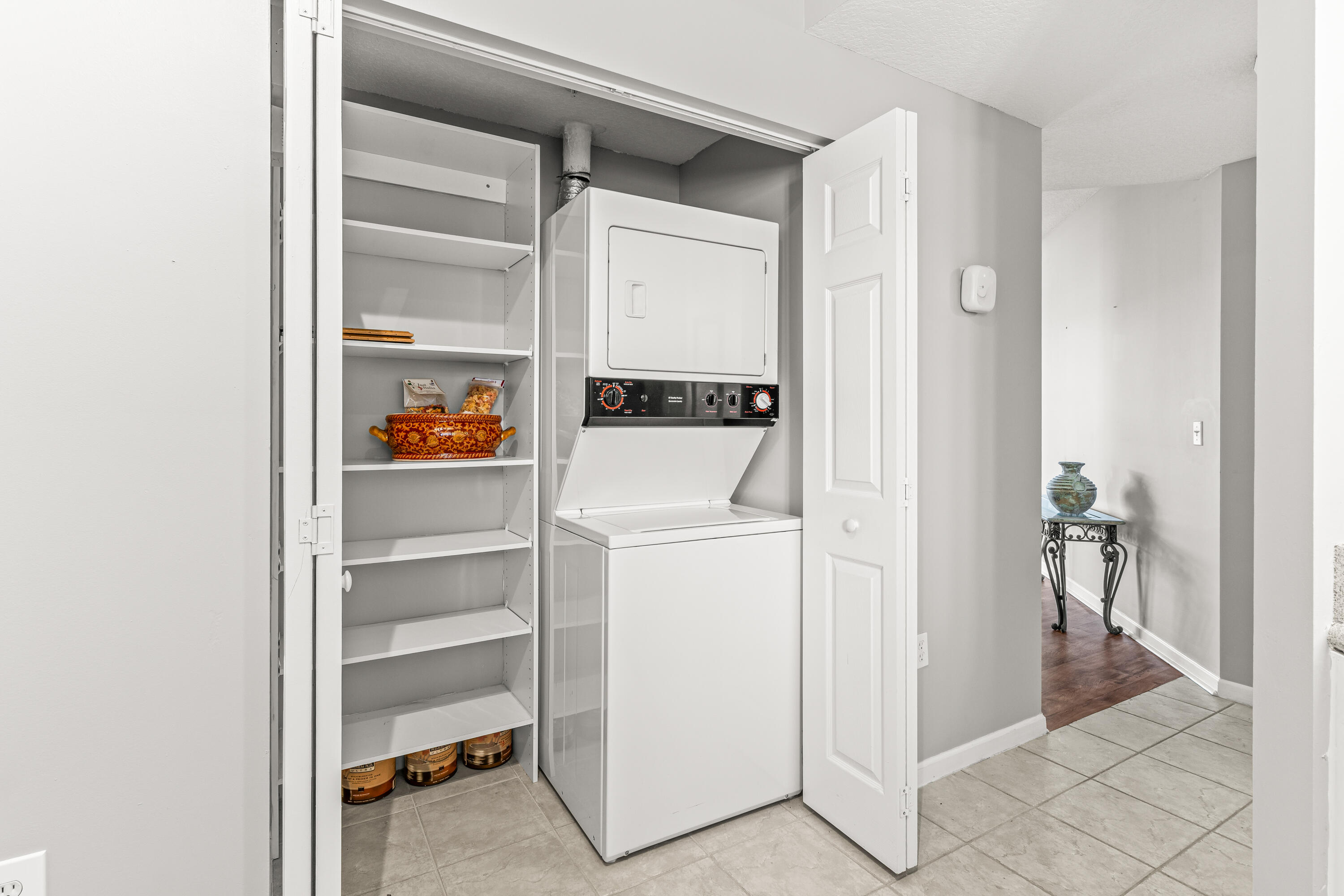1951 Brandywine Road, Unit 59303 West Palm Beach, FL 33409 - Photo 15 of 25 a utility room with dryer and washer