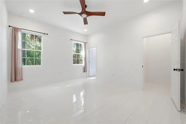 a view of an empty room with a window