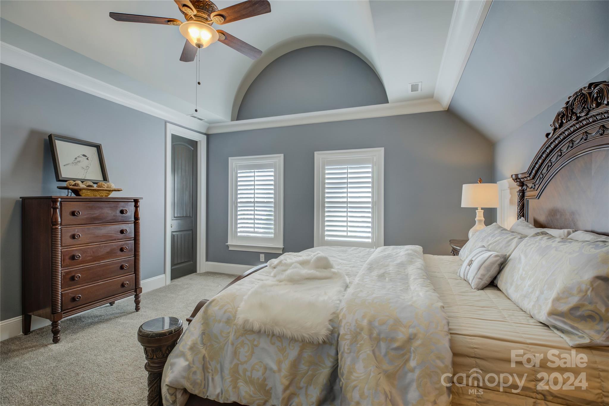 2001 Bessbrook Road Fort Mill, SC 29708 - Photo 29 of 48 a bedroom with a bed and a chandelier