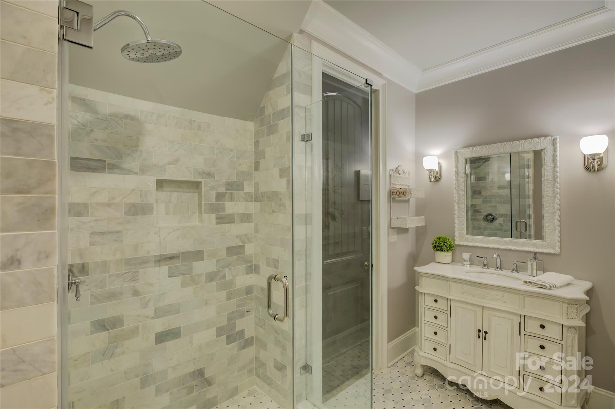 2001 Bessbrook Road Fort Mill, SC 29708 - Photo 34 of 48 a bathroom with a shower sink and mirror
