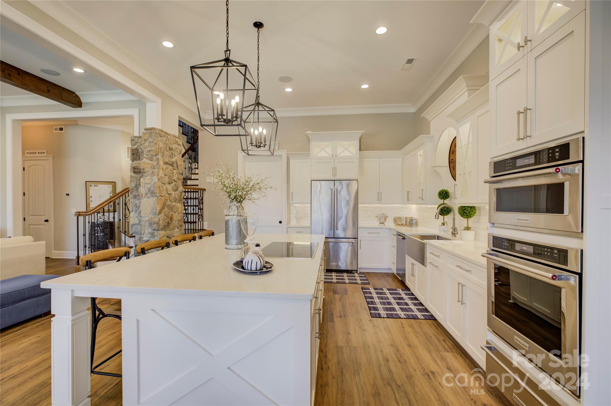 2001 Bessbrook Road Fort Mill, SC 29708 - Photo 40 of 48 a kitchen with stainless steel appliances kitchen island granite countertop a sink and cabinets