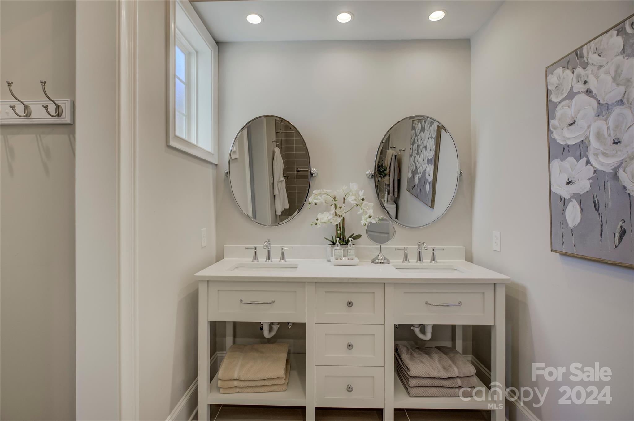 2001 Bessbrook Road Fort Mill, SC 29708 - Photo 43 of 48 a bathroom with a double vanity sink and a mirror