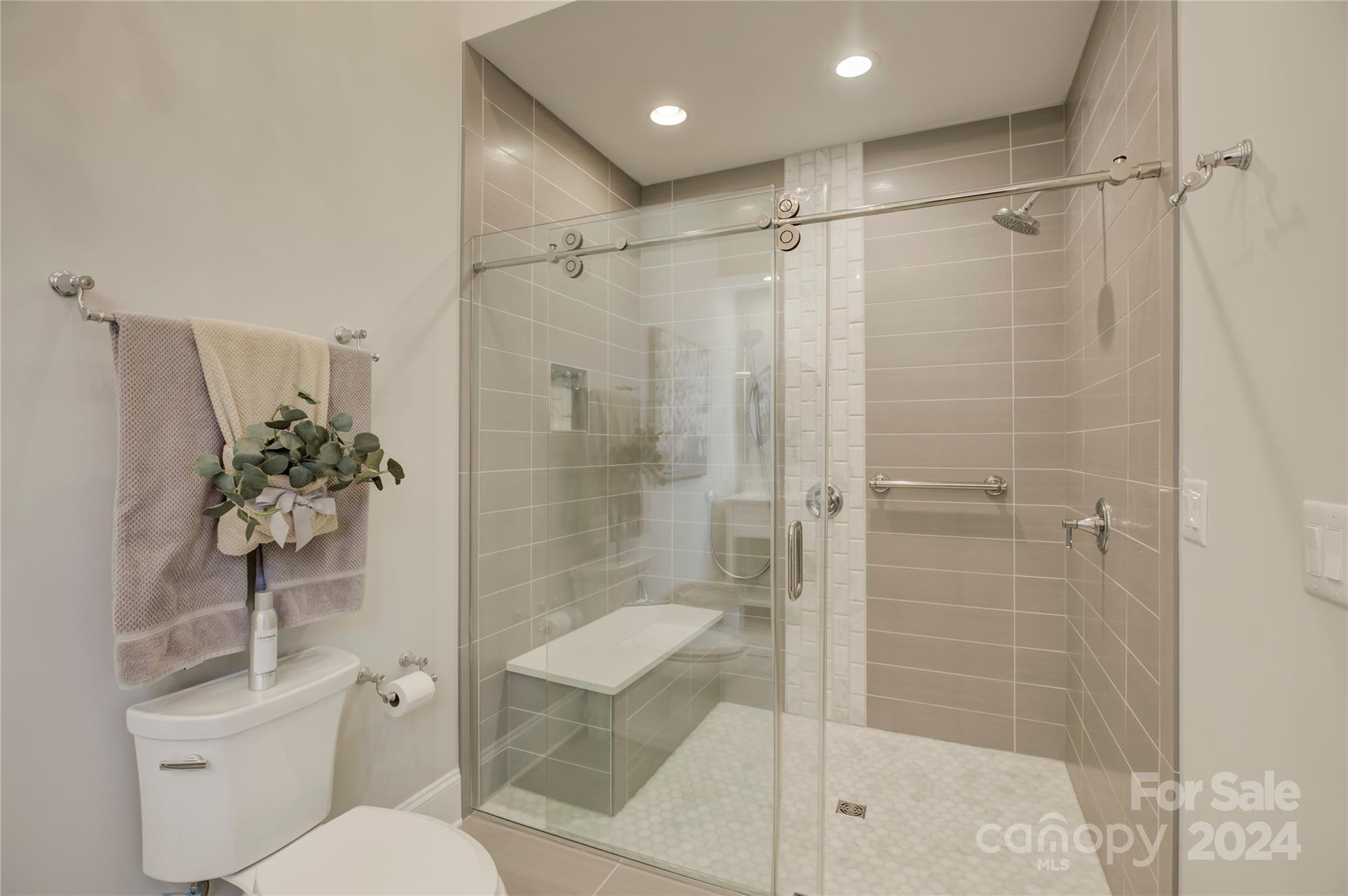 2001 Bessbrook Road Fort Mill, SC 29708 - Photo 44 of 48 a bathroom with a shower a toilet and a glass window