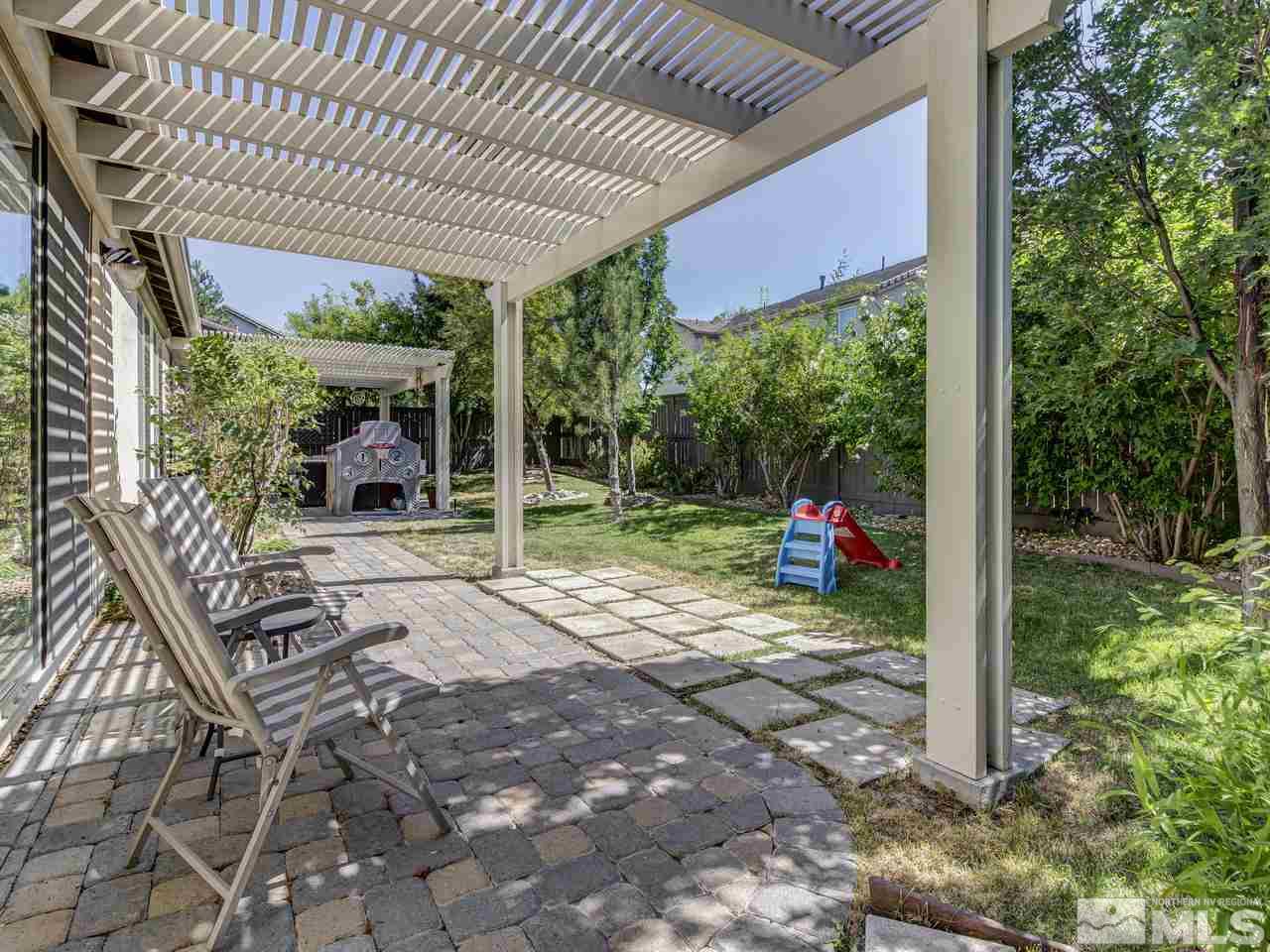560 Secretariat Court Reno, NV 89521 - Photo 21 of 25 a view of a porch with furniture and garden