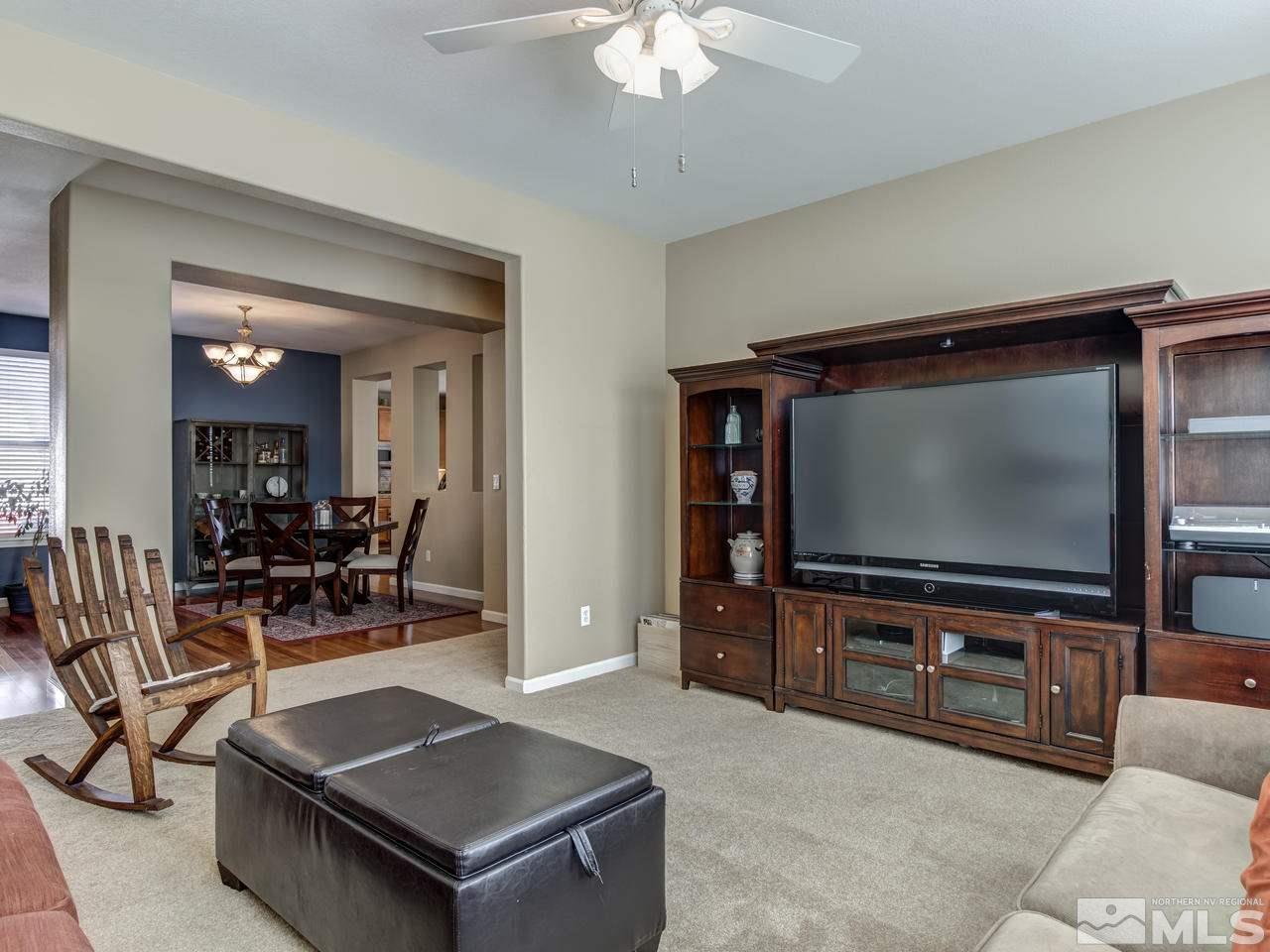 560 Secretariat Court Reno, NV 89521 - Photo 5 of 25 a living room with furniture and a flat screen tv