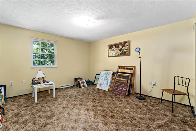 a view of a workspace with furniture