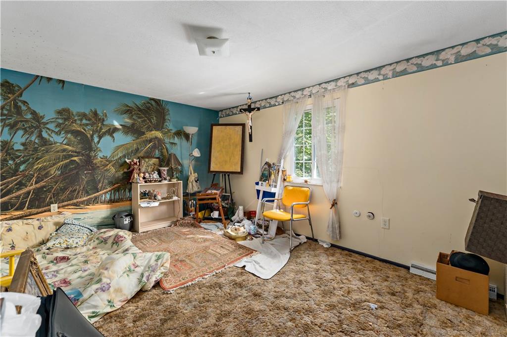 216 Catalpa Place Pittsburgh, PA 15228 - Photo 20 of 43 a room with furniture and a flat screen tv