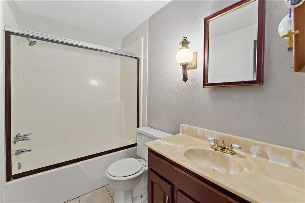 216 Catalpa Place Pittsburgh, PA 15228 - Photo 22 of 43 a bathroom with a sink and a mirror