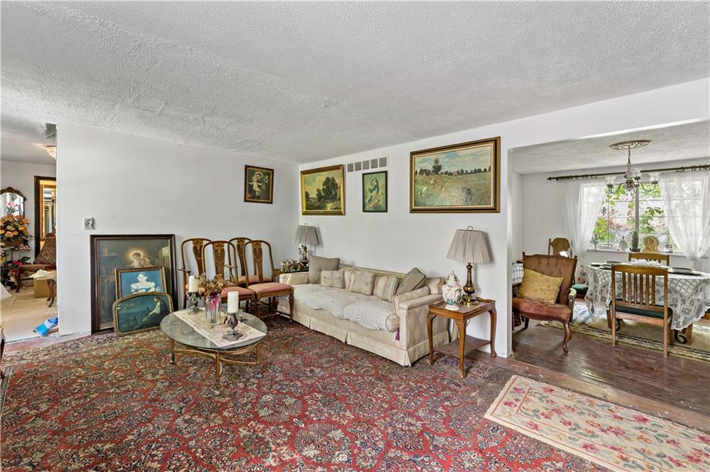 216 Catalpa Place Pittsburgh, PA 15228 - Photo 3 of 43 a living room with furniture and wooden floor