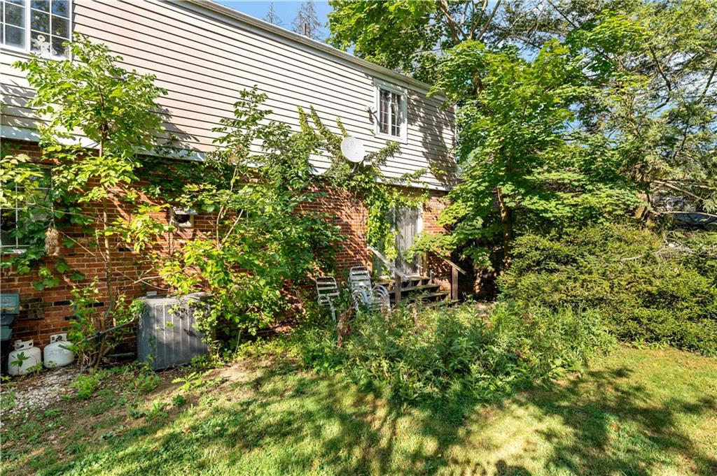 216 Catalpa Place Pittsburgh, PA 15228 - Photo 32 of 43 a view of a house with a tree
