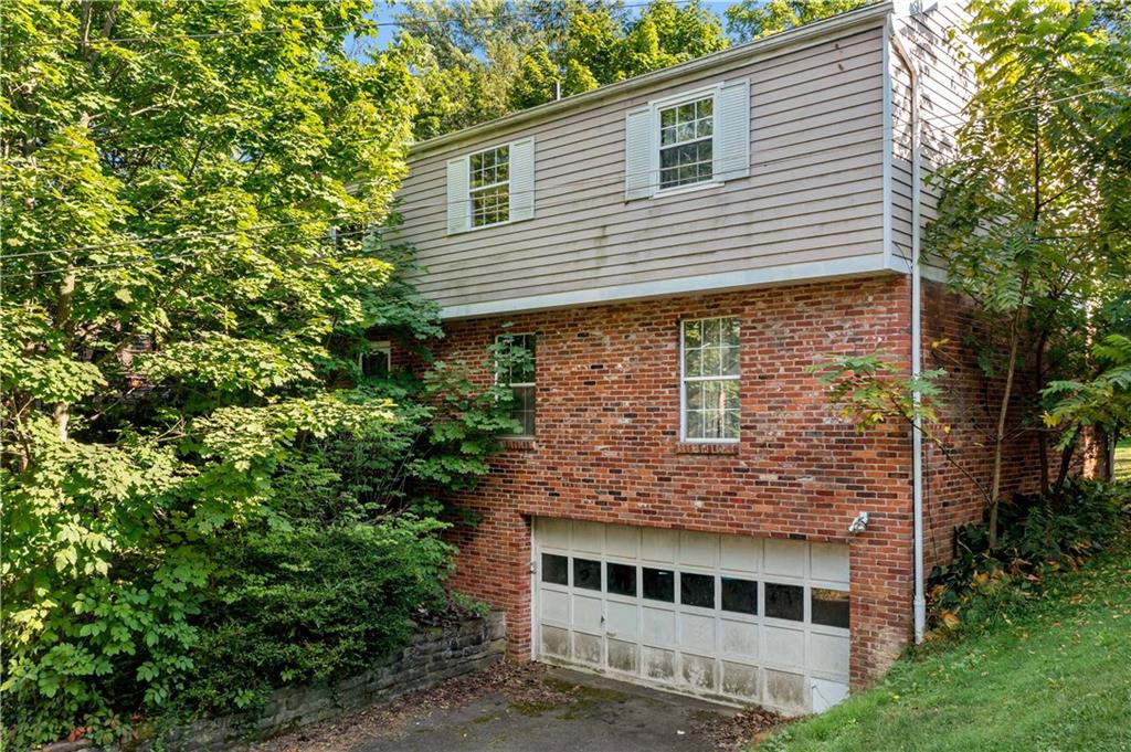 216 Catalpa Place Pittsburgh, PA 15228 - Photo 35 of 43 a front view of a house with a yard