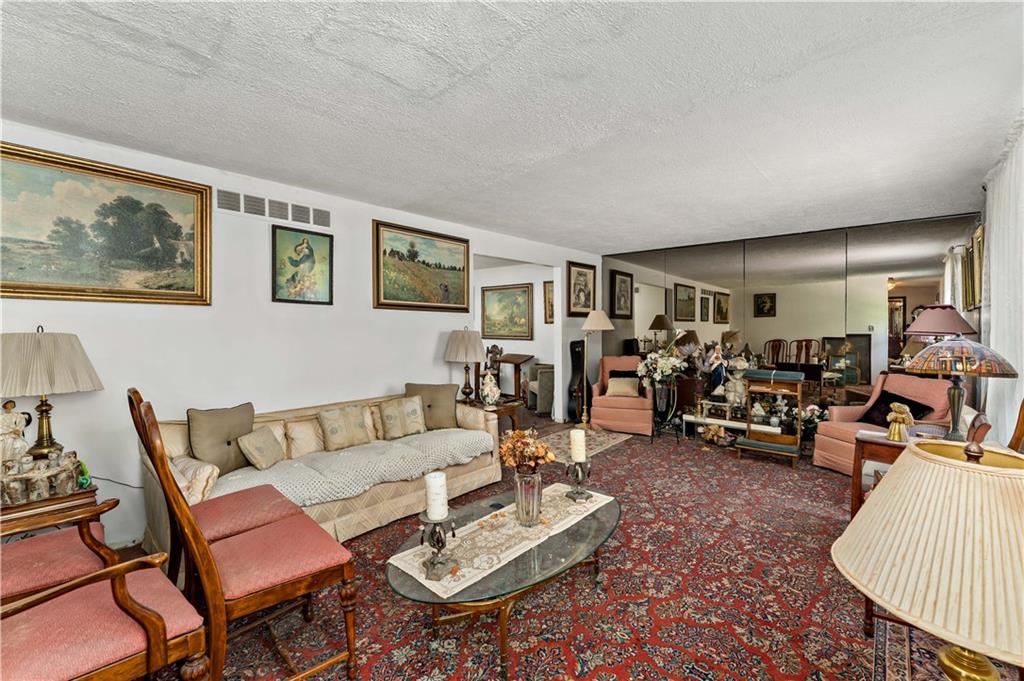 216 Catalpa Place Pittsburgh, PA 15228 - Photo 6 of 43 a living room with furniture and wooden floor