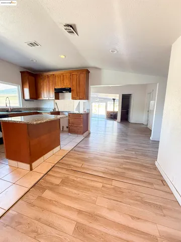 a house with trees in the background