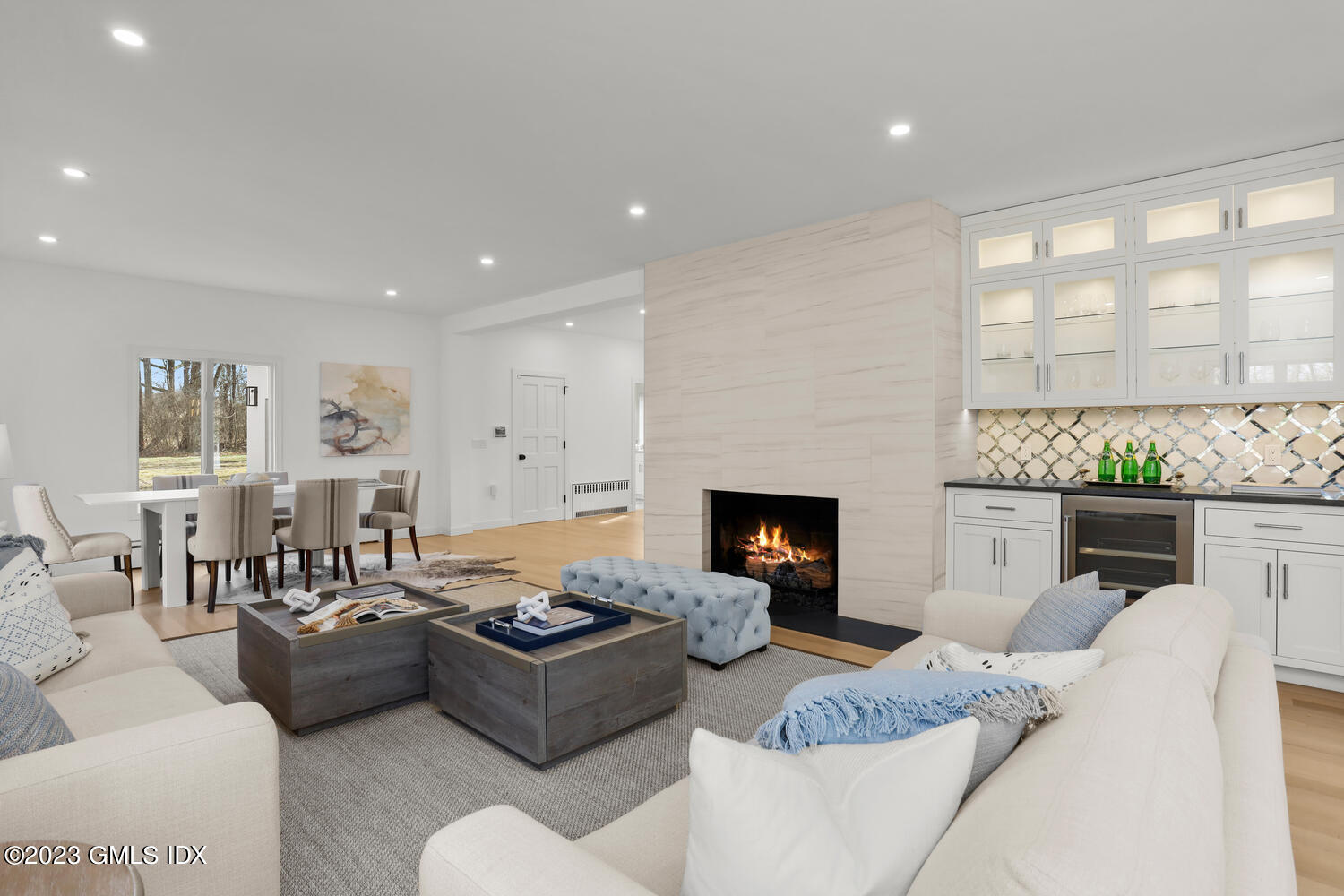 10 Harkim Road Greenwich, CT 06831 - Photo 36 of 39 a living room with furniture fireplace and a fireplace