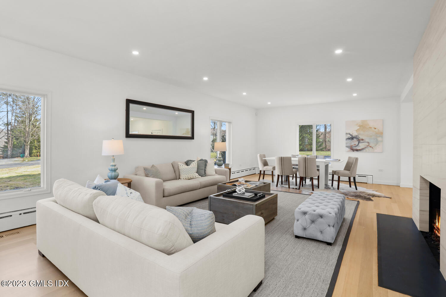 10 Harkim Road Greenwich, CT 06831 - Photo 11 of 39 a living room with furniture and a flat screen tv