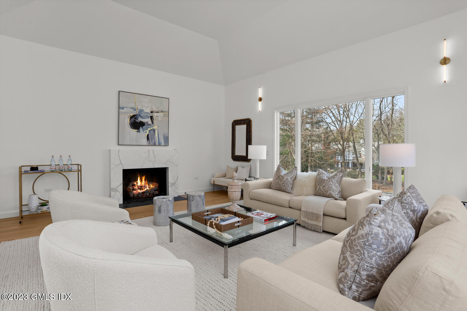 10 Harkim Road Greenwich, CT 06831 - Photo 16 of 39 a living room with furniture and a fireplace