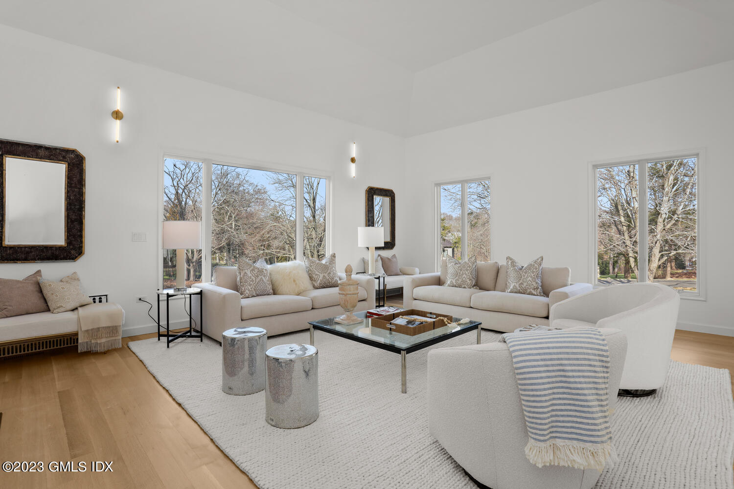 10 Harkim Road Greenwich, CT 06831 - Photo 18 of 39 a living room with furniture and a large window