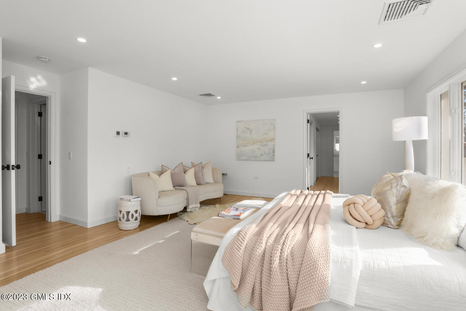 10 Harkim Road Greenwich, CT 06831 - Photo 20 of 39 a bedroom with a bed and couch