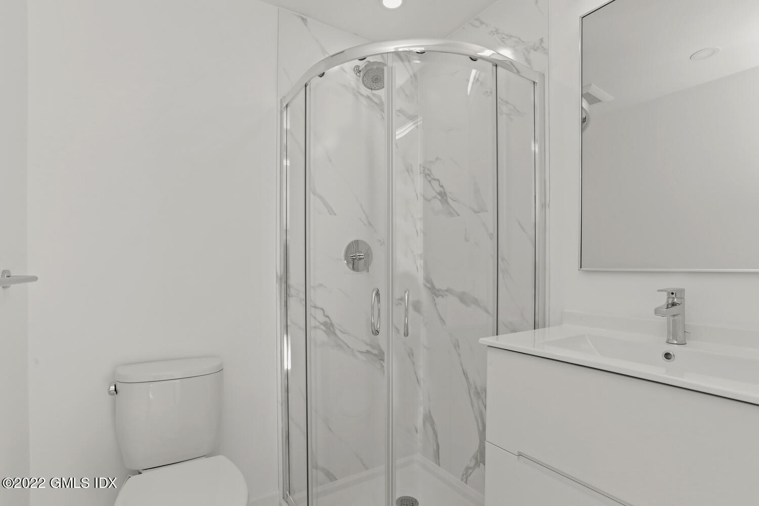 10 Harkim Road Greenwich, CT 06831 - Photo 24 of 39 a bathroom with a shower a toilet and sink