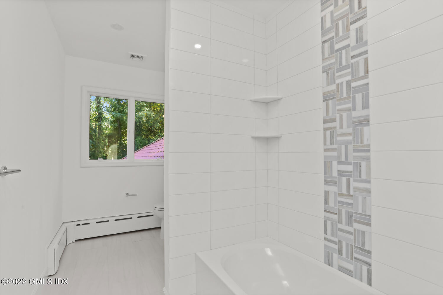 10 Harkim Road Greenwich, CT 06831 - Photo 25 of 39 a bathroom with a bathtub