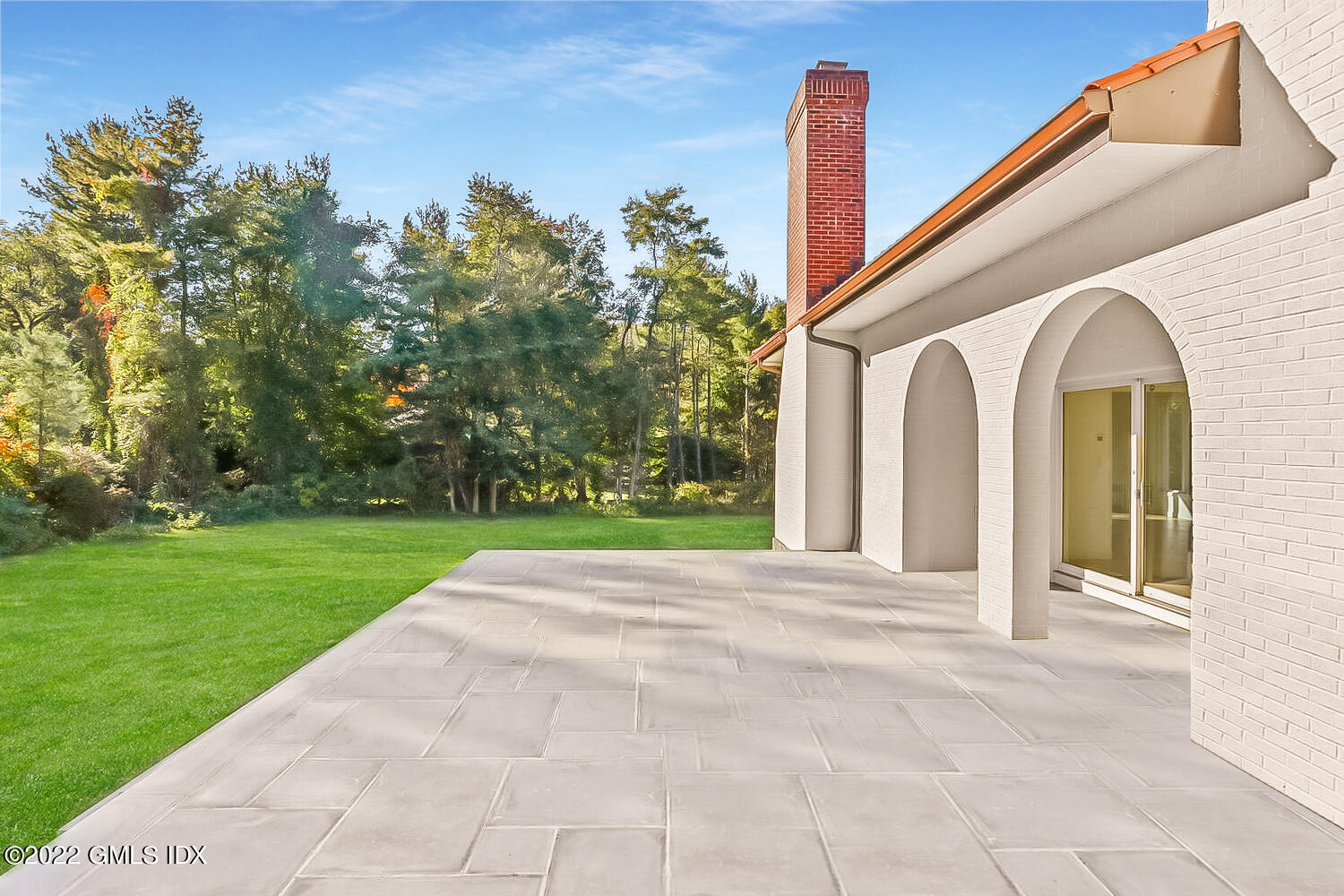 10 Harkim Road Greenwich, CT 06831 - Photo 27 of 39 a view of backyard with large trees