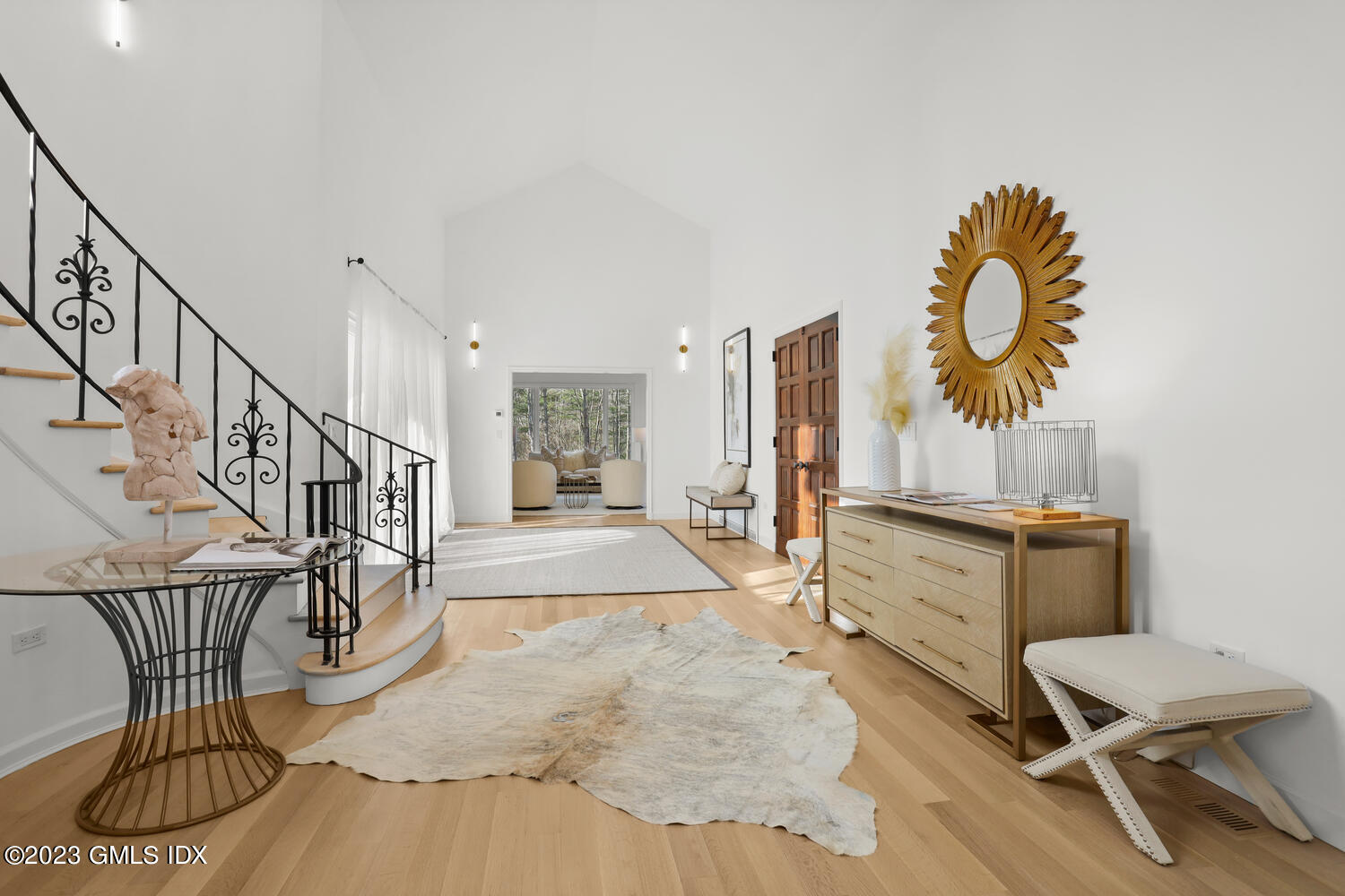 10 Harkim Road Greenwich, CT 06831 - Photo 7 of 39 a view of a livingroom with furniture and staircase