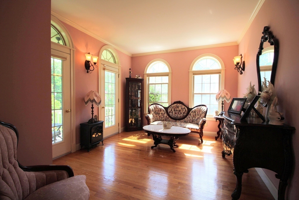 5 Gableview Lane Southwick, MA 01077 - Photo 21 of 41 a living room with fireplace furniture and a large window