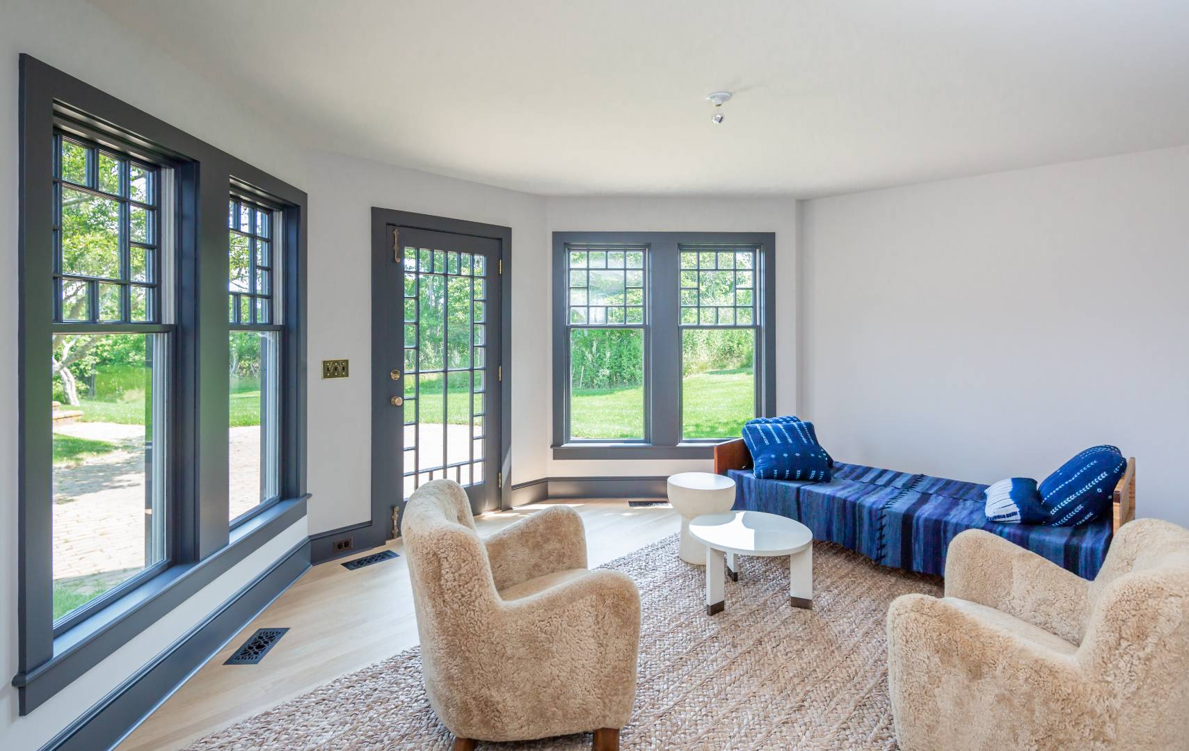 153 Deforest Road Montauk, NY 11954 - Photo 12 of 23 a living room with furniture and a large window