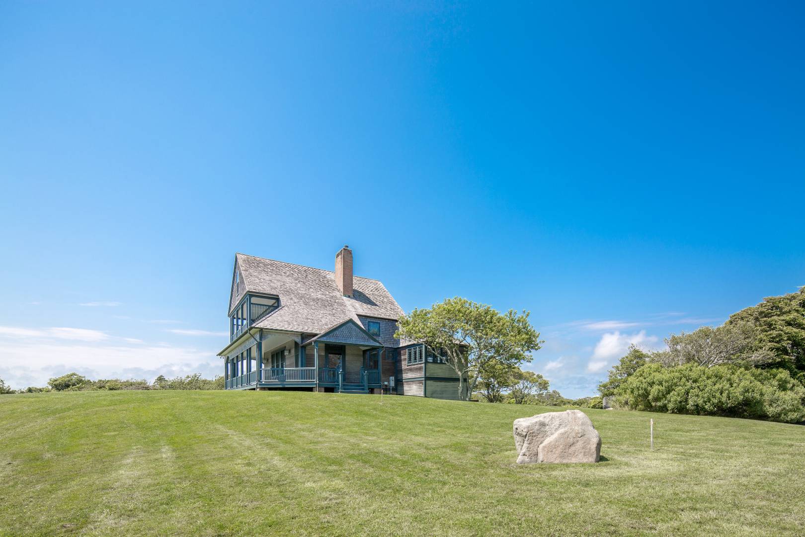 153 Deforest Road Montauk, NY 11954 - Photo 21 of 23 a front view of a house with a yard