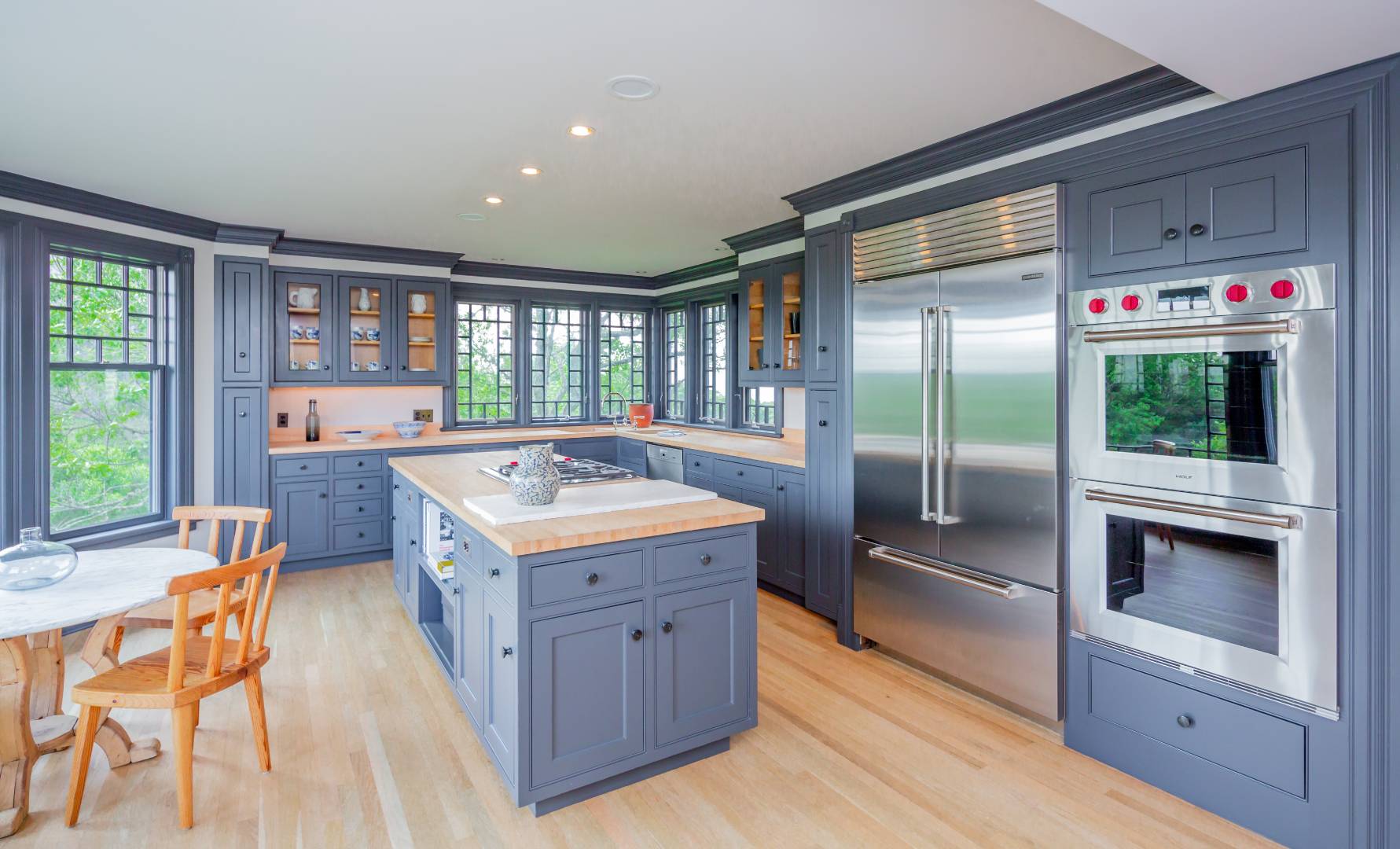 153 Deforest Road Montauk, NY 11954 - Photo 4 of 23 a kitchen that has a sink a stove and a refrigerator