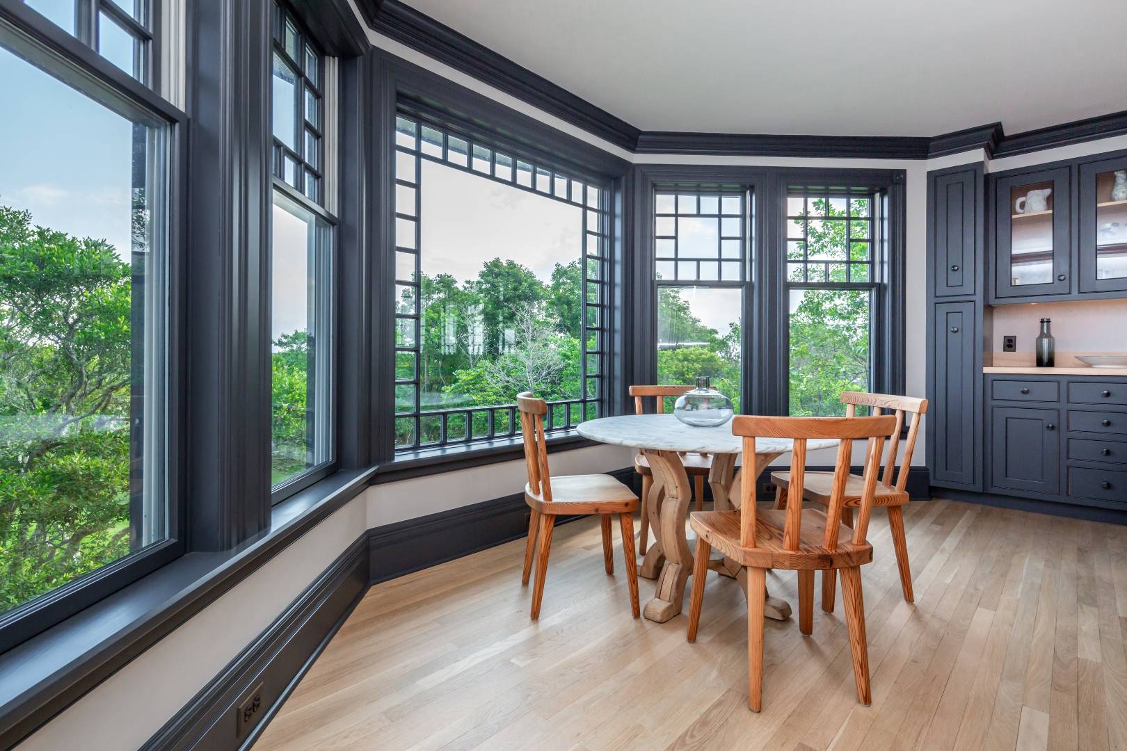 153 Deforest Road Montauk, NY 11954 - Photo 6 of 23 a dining room with furniture and wooden floor