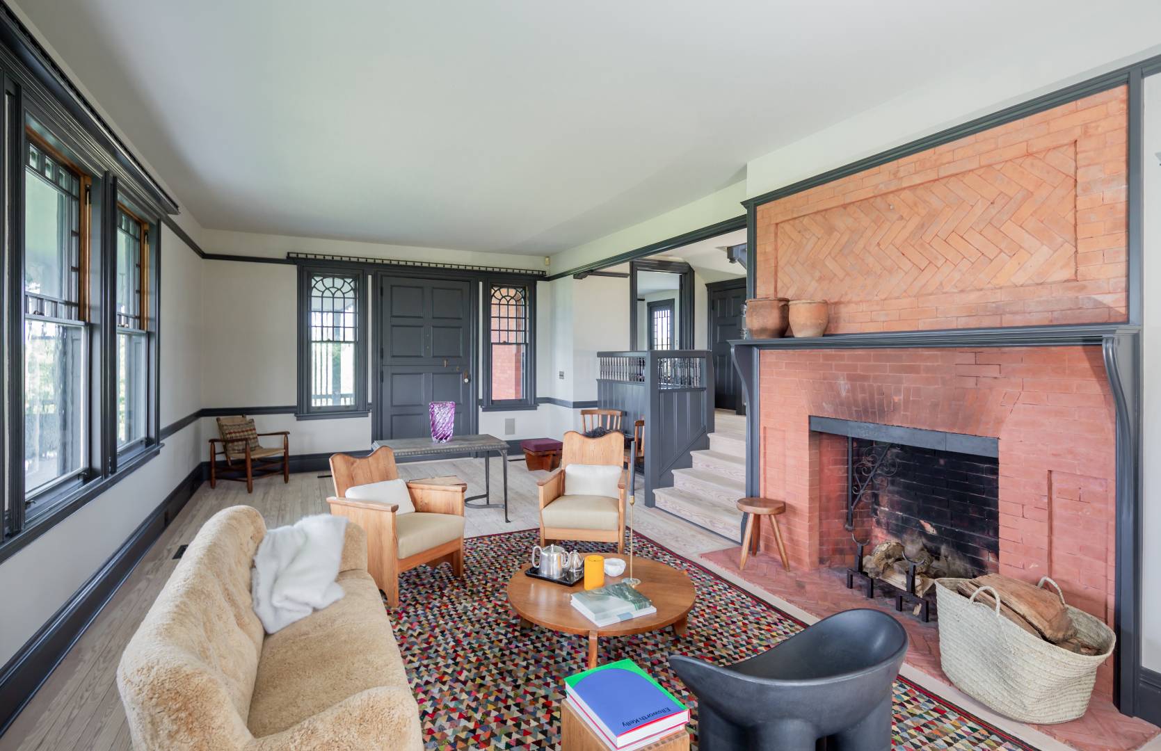 153 Deforest Road Montauk, NY 11954 - Photo 8 of 23 a living room with furniture and a fireplace