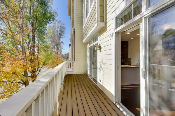 a view of balcony and wooden floor