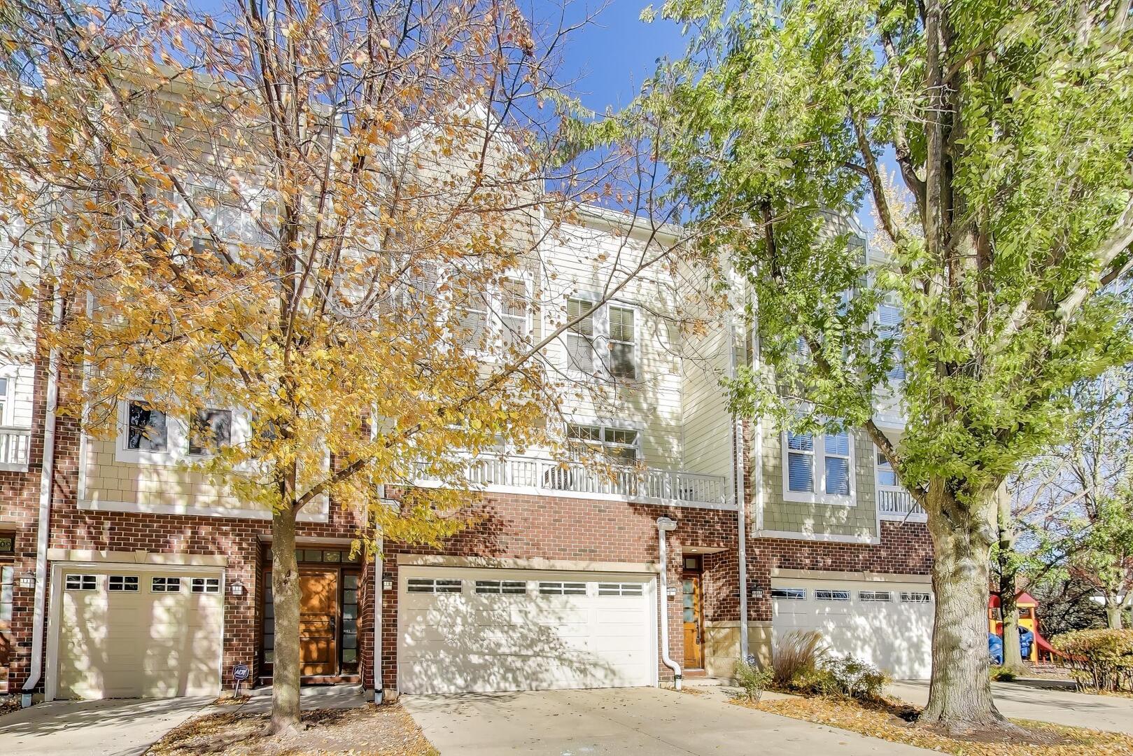 513 Grove Lane Forest Park, IL 60130 - Photo 2 of 34 front view of a building with a tree