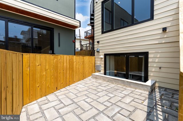 a view of a house with a large window