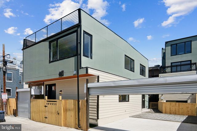a front view of a house with a garage