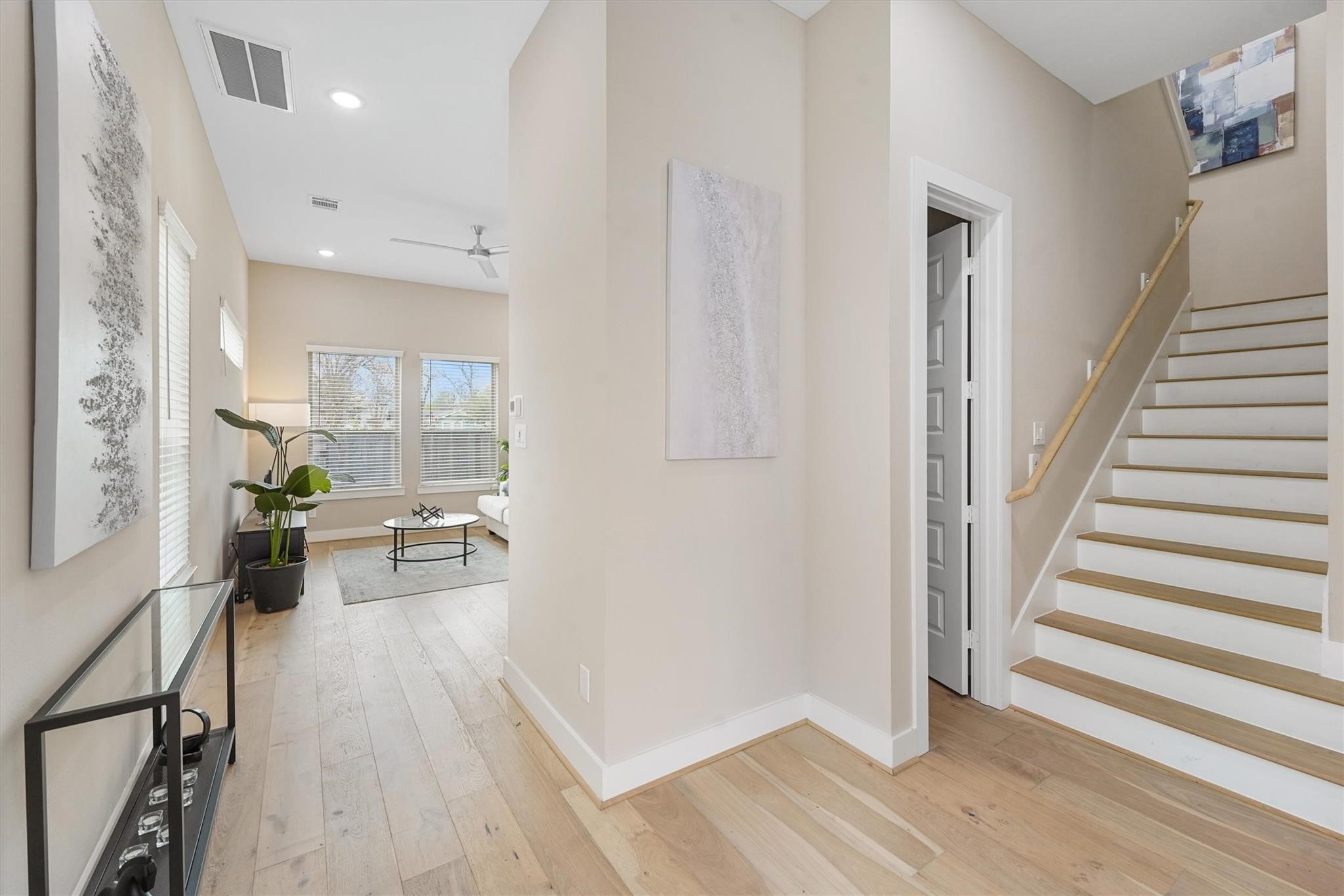 a view of a living room and entry way