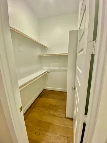 a bathroom with a sink mirror toilet and bathtub
