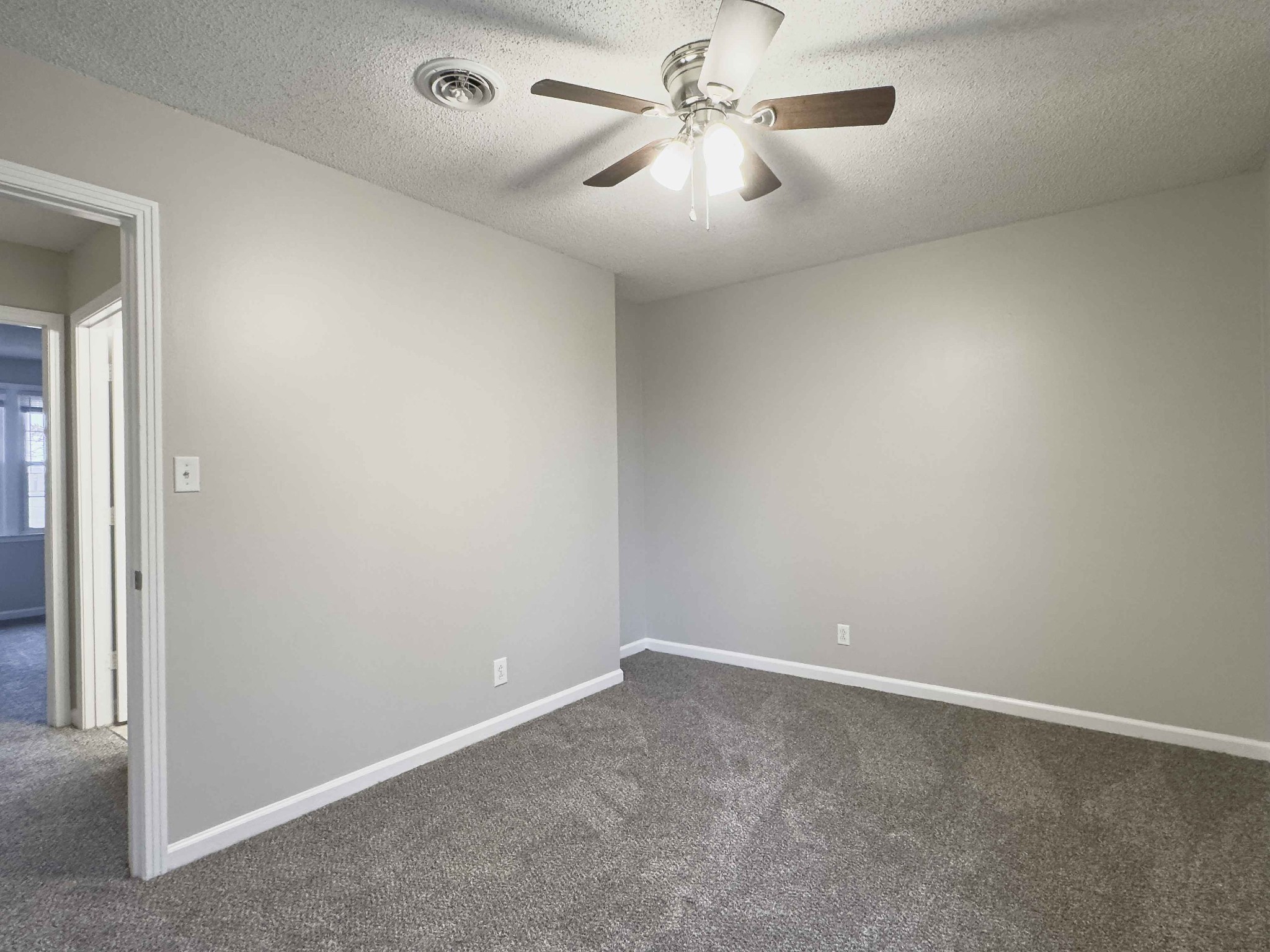 610 Sango Road Clarksville, TN 37043 - Photo 15 of 21 an empty room with a window and a fan