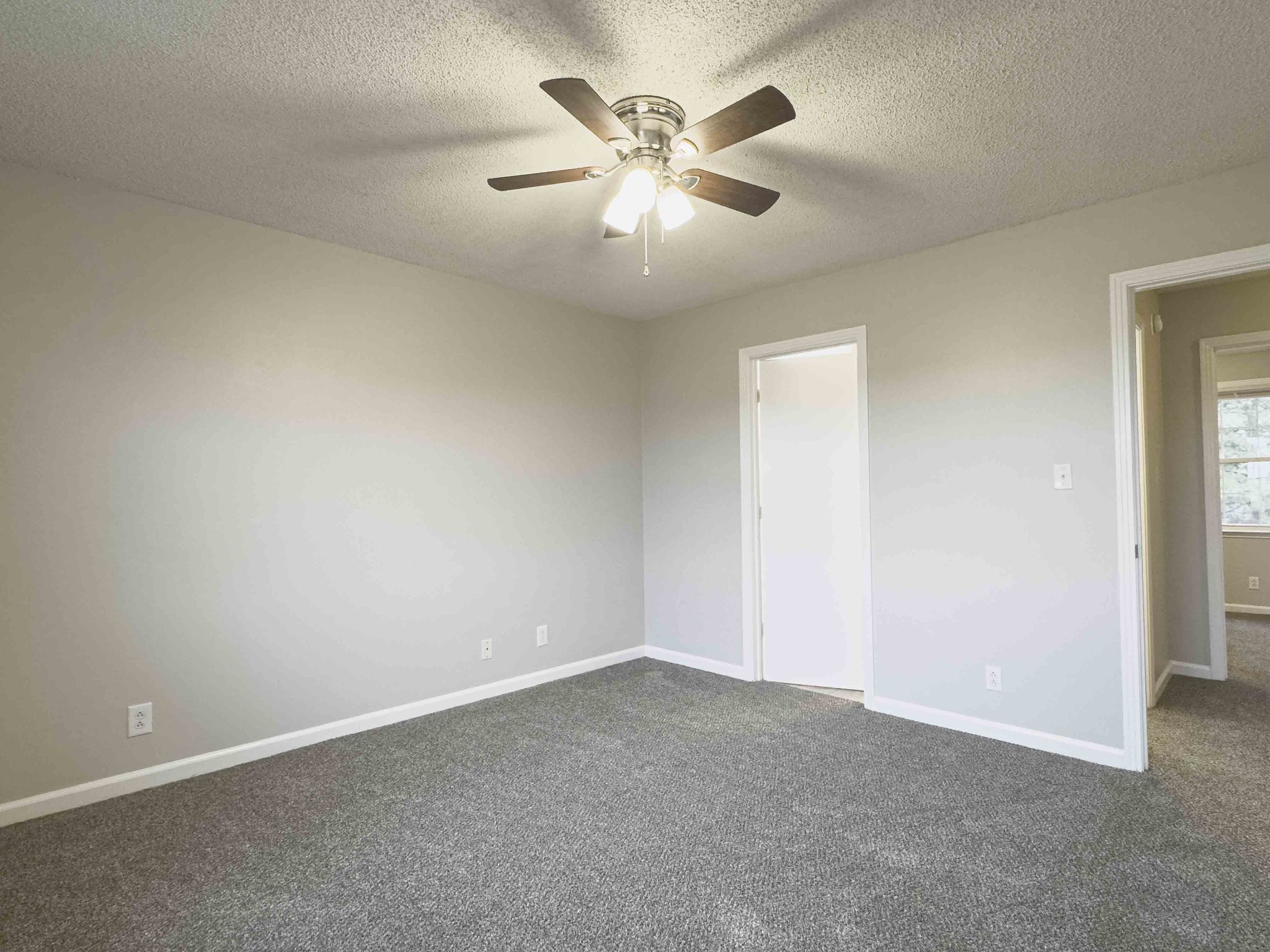 610 Sango Road Clarksville, TN 37043 - Photo 20 of 21 an empty room with chandelier fan and windows