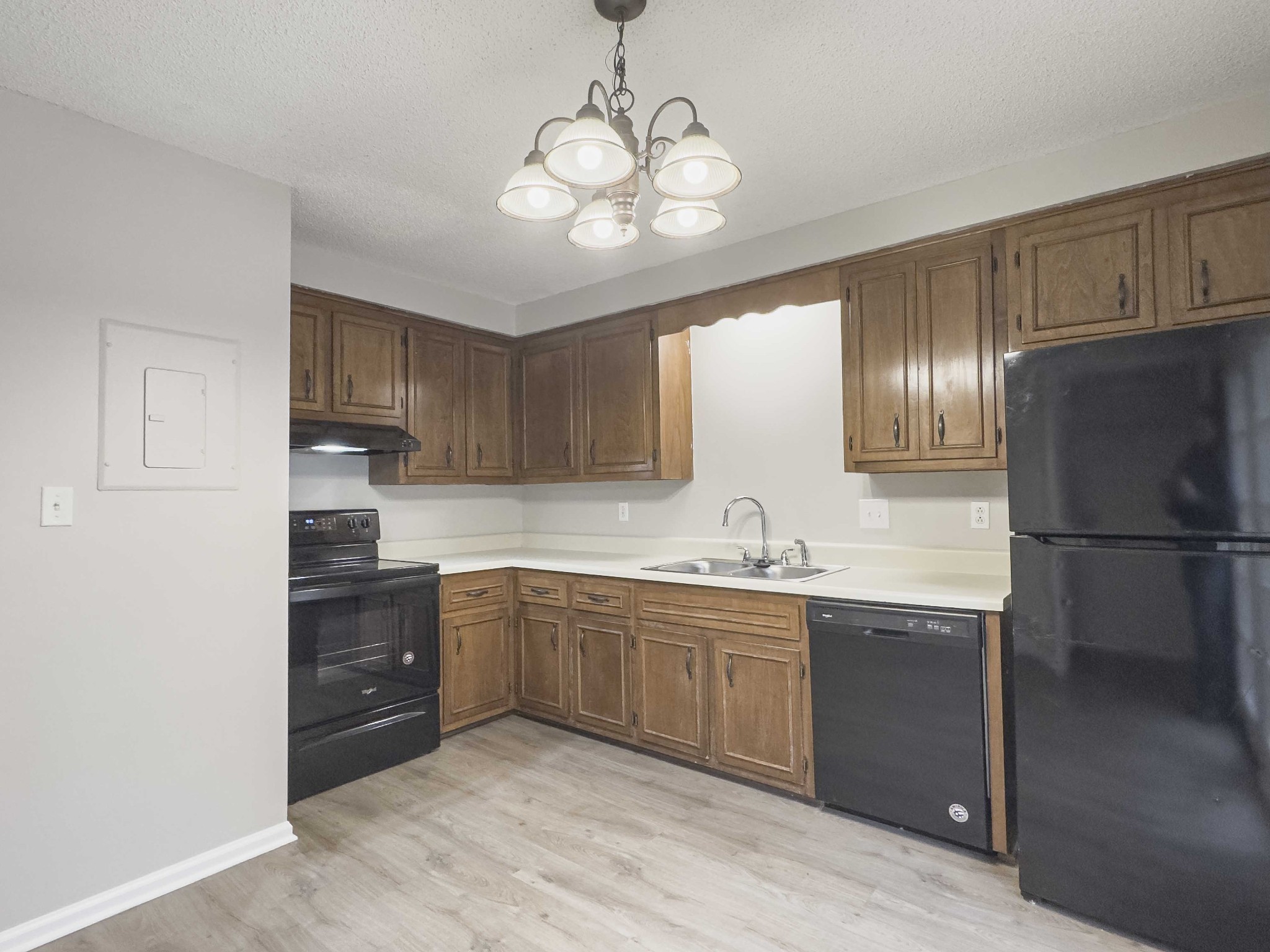 610 Sango Road Clarksville, TN 37043 - Photo 8 of 21 a kitchen with stainless steel appliances granite countertop a sink refrigerator and cabinets