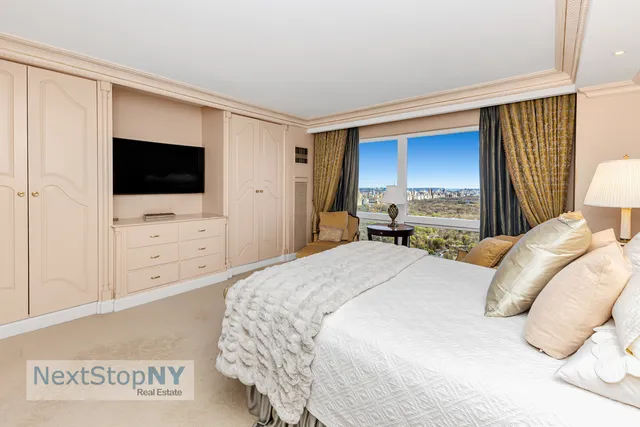 a view of a hallway with a living area